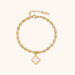 18K gold-plated oval bead bracelet with a four-leaf clover charm in mother-of-pearl or black enamel, adjustable lobster clasp, on white background.