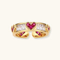 Gold-plated adjustable ring with alternating red heart-shaped and clear rectangular zirconia stones in geometric pattern
